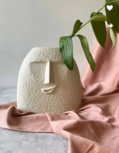 Ceramic face vase