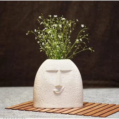 Ceramic face vase