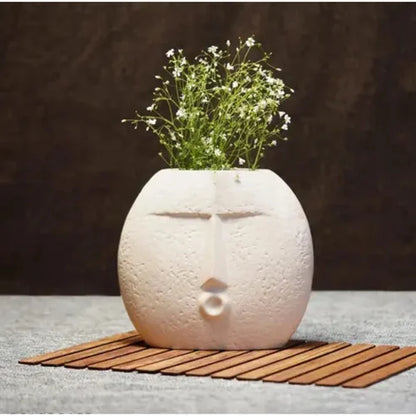 Ceramic face vase
